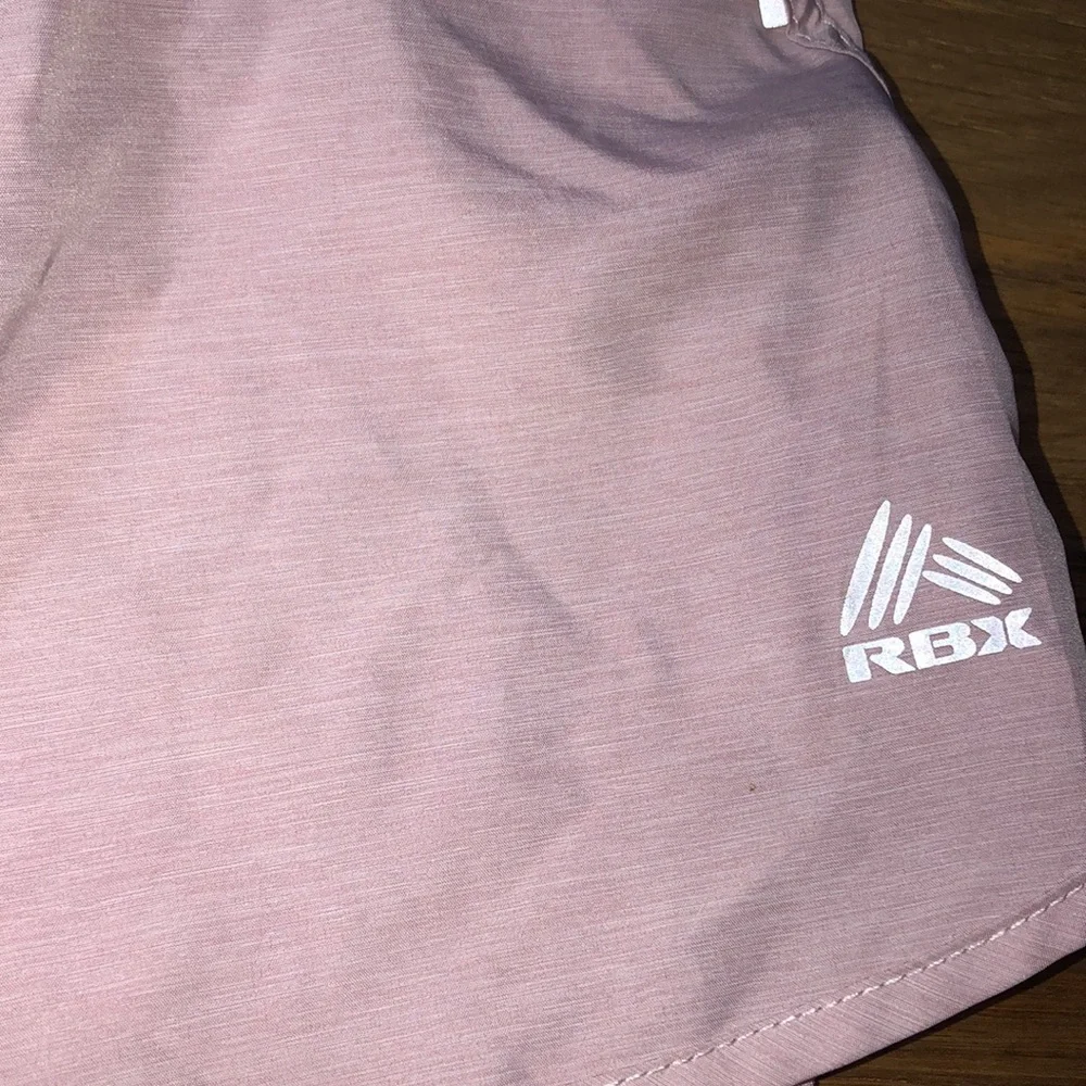 REEBOK pink performance running shorts